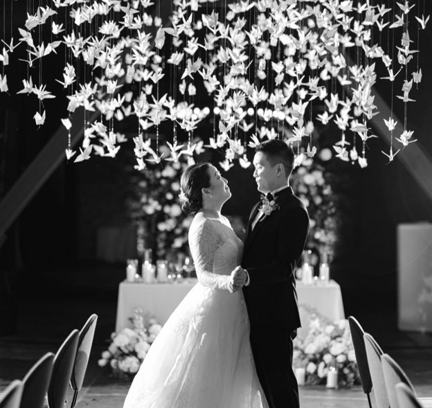 Custom ceiling display of fifteen-hundred hand-folded paper cranes.